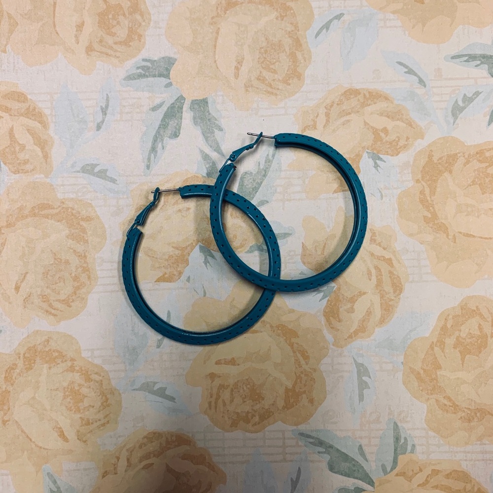 Blue hoop earrings with holes